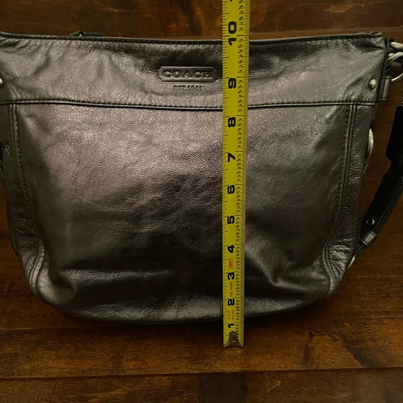 Leather Coach crossbody purse in a pewter color. - Picture 5 of 8